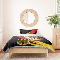 Black duvet cover with dartboard and shield design, paired with two red-yellow pillowcases
