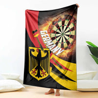 Darts blanket with flaming dartboard, red center stripe, black background and yellow banner