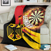 Darts blanket on armchair; black with red panel, dartboard target and roaring flames