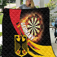 Germany-themed darts quilt with black, red, and yellow shield and dartboard design