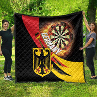 Quilt with black diamond stitching, Germany crest and dartboard artwork in red and yellow