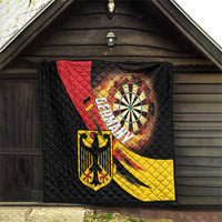 Germany darts quilt hanging outdoors with black diamond pattern, dartboard, and crest