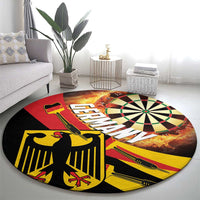 Round dartboard-style carpet rug with bullseye target and black, red, yellow design