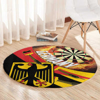 Round dartboard-style rug with target bullseye and black base with red and yellow tones