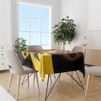 Flaming dartboard-style tablecloth, black and yellow with red accents
