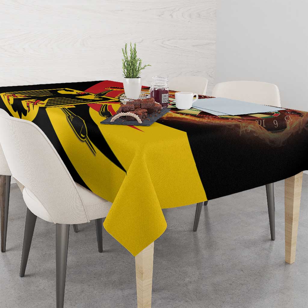 Black and yellow dartboard-style tablecloth with red flaming dart motif