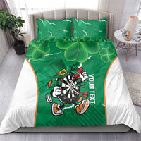Green bedding set with clover shamrock pattern and running darts mascot holding a dartboard.