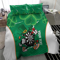Green duvet cover with clover shamrock design and running darts mascot on the center panel.