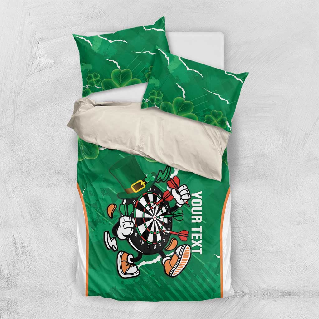 Green duvet cover and pillowcases with clover shamrock pattern and darts mascot dartboard design.