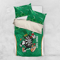 Green duvet cover and pillowcases with clover shamrock pattern and darts mascot dartboard design.