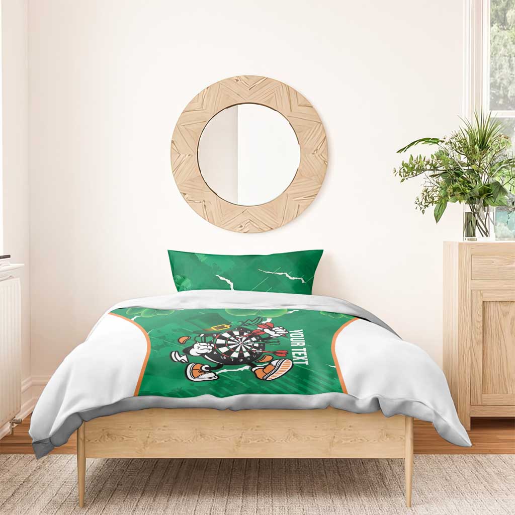 Green duvet and pillowcase set with clover shamrock pattern and darts mascot centered on bed.