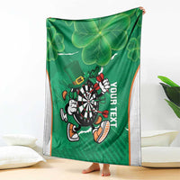 Green darts blanket with shamrock clover leaves, dartboard mascot and 'YOUR TEXT' text, white border