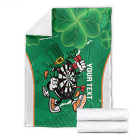 Folded green personalised darts blanket with shamrock clover leaves, dartboard mascot and white edge