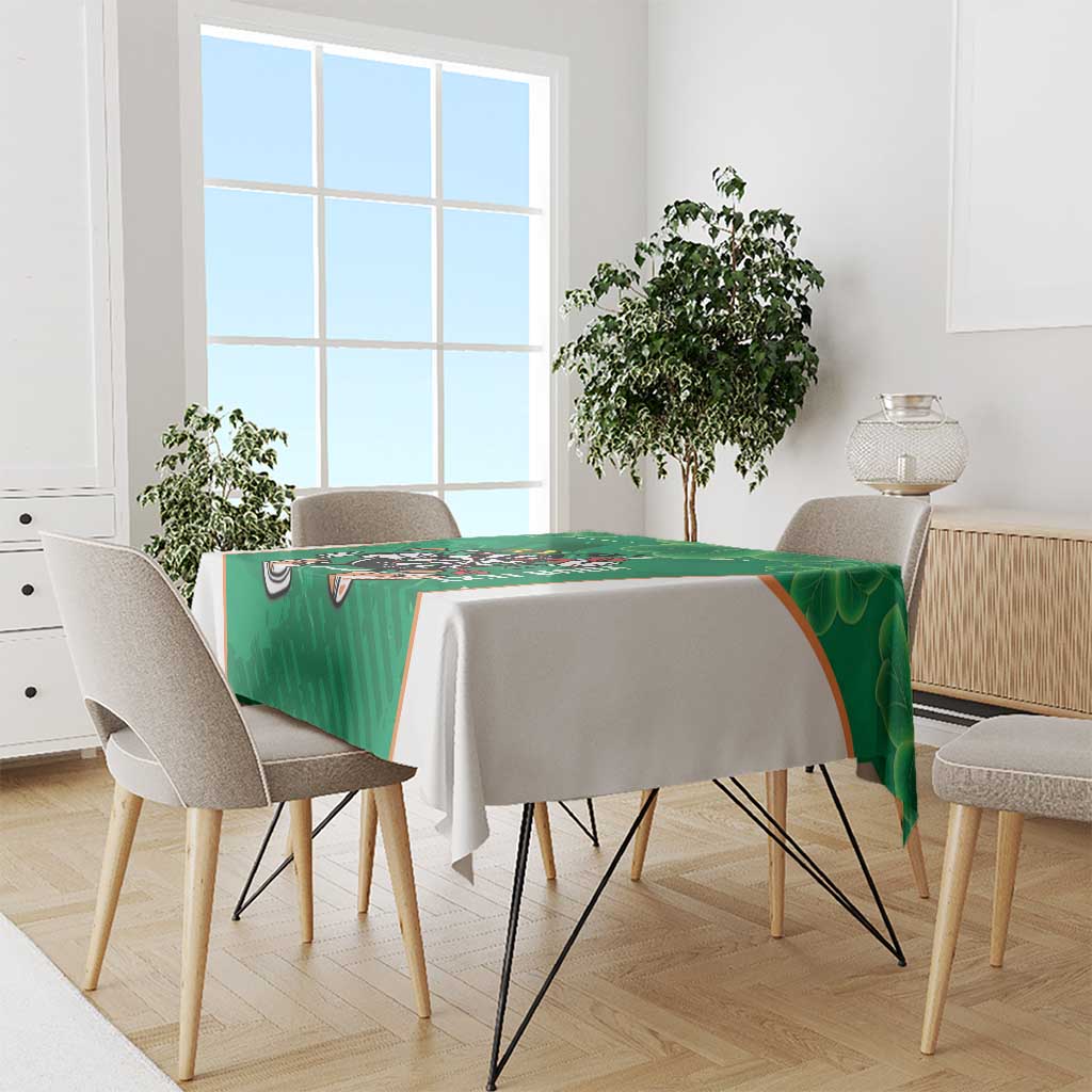 Green darts tablecloth with dartboard mascot and shamrock-themed pattern
