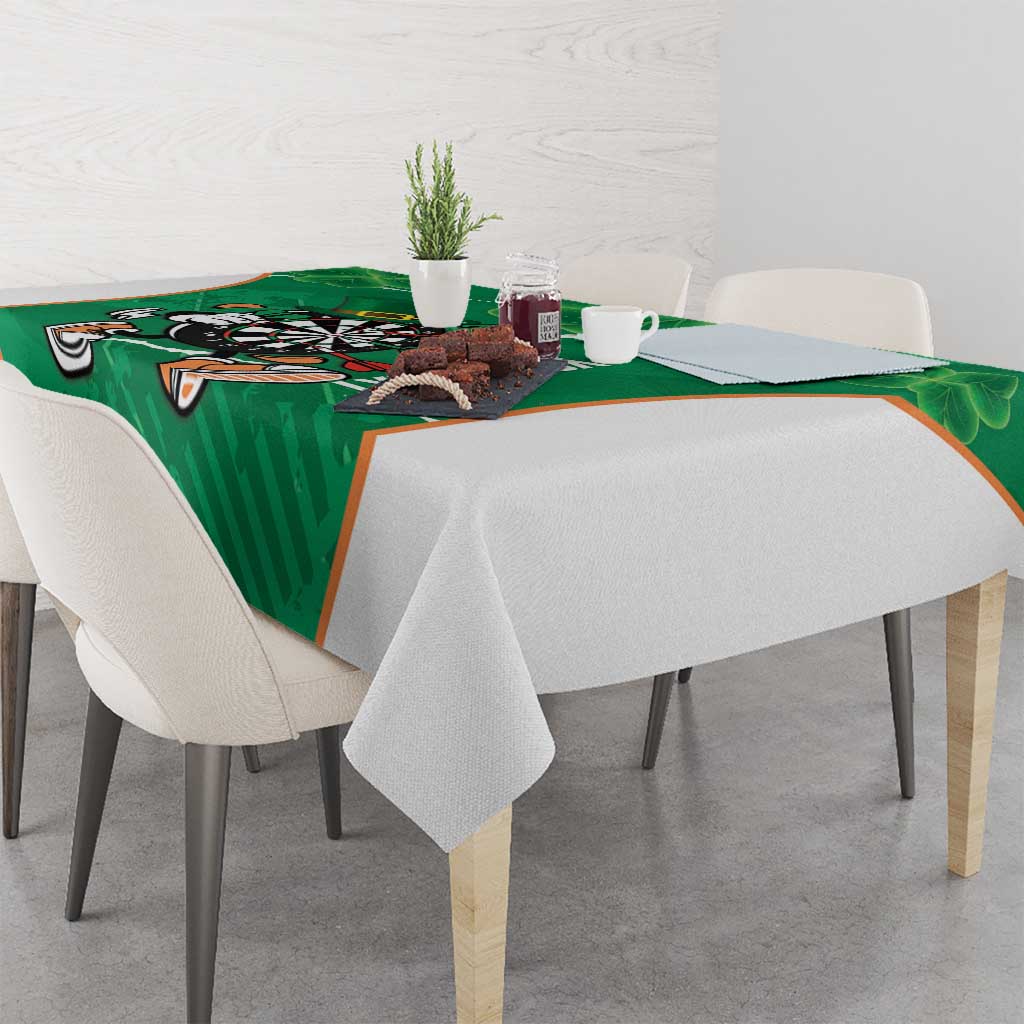 Green tablecloth for darts featuring dartboard mascot and shamrock design
