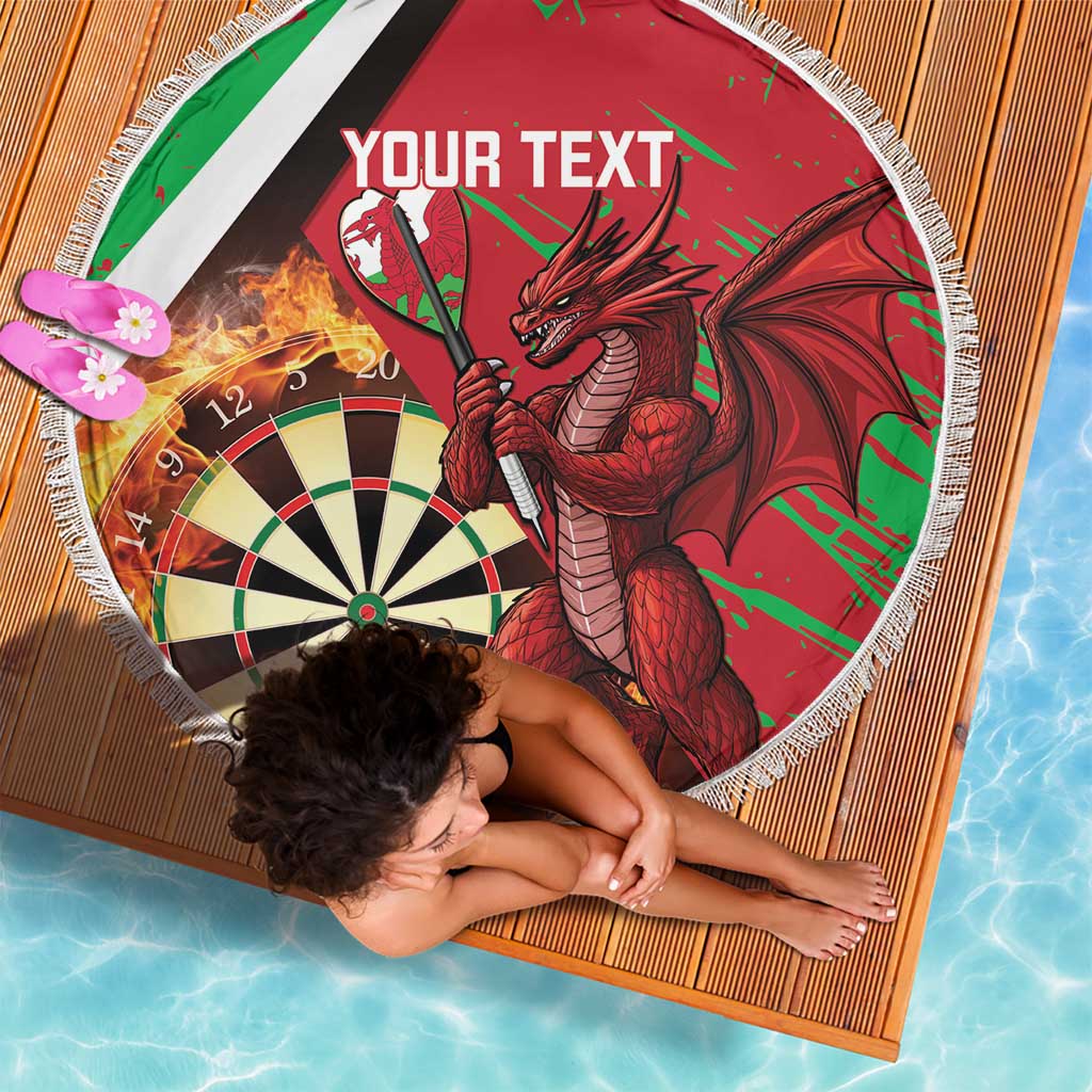 Round red darts beach blanket with fringed edge, dartboard, dragon artwork, and custom text