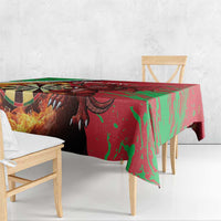 Darts tablecloth hanging over table edge, green-red dragon and dartboard design