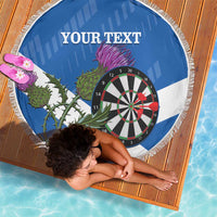 Round blue and white darts beach blanket with dartboard and thistle design, fringed border