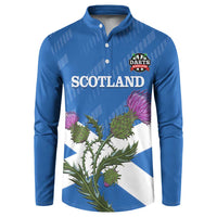 Blue button sweatshirt with Scotland graphic, darts logo, and thistle on flag design