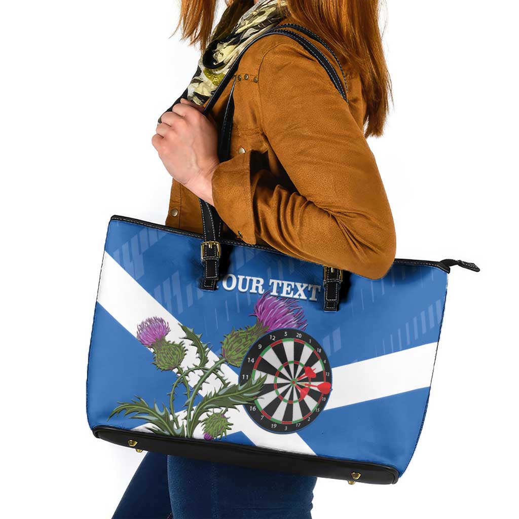 Blue leather tote bag with Scotland flag print, dartboard and thistle, black handles
