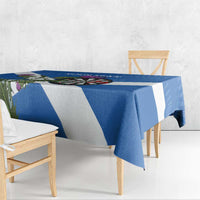 Blue and white Scotland darts tablecloth draped over bench with dartboard and thistle
