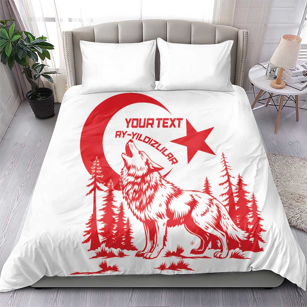 White duvet and pillows with red wolf, pine trees, and crescent-star artwork