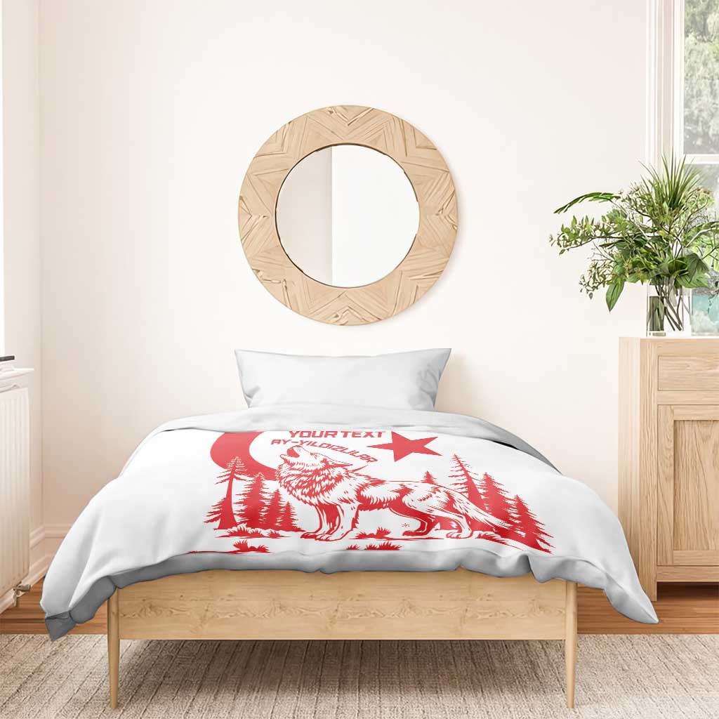 White duvet and pillow with red wolf, pine trees, and crescent-star motif
