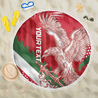 Round red, green and white Hungary football beach blanket with winged lion print