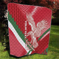 Red Hungary football quilt with eagle artwork, green diagonal stripe, and quilted texture