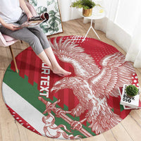Red round carpet with white eagle and vertical text print on the left
