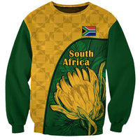 Unisex yellow and green crewneck sweatshirt with South Africa protea graphic, kente pattern