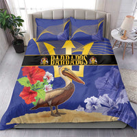 Blue bedding set on bed with pelican, hibiscus flowers, and gold trident and star motifs