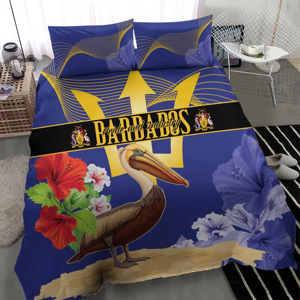 Blue bedding set with pelican, hibiscus flowers, and gold trident emblem; two pillowcases