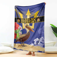 Blue blanket with gold emblem star, pelican graphic, and hibiscus flowers