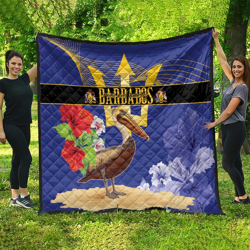 Blue Barbados quilt with large banner design showing trident, pelican, and floral accents