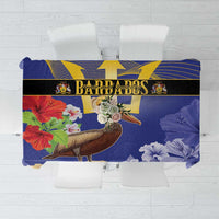 Blue tablecloth with brown pelican, trident, and decorative Barbados-themed border