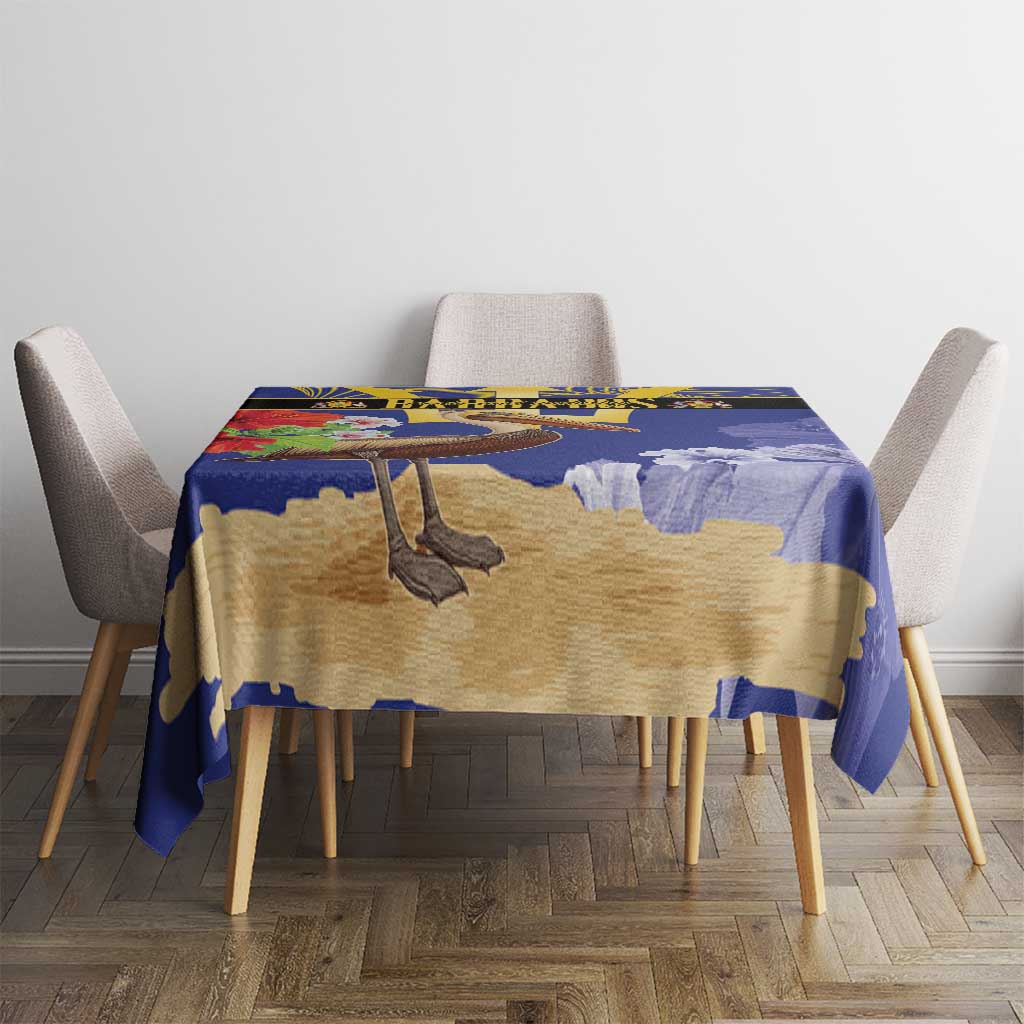 Blue and tan tablecloth with pelican and trident center design on dining table