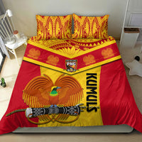 Rugby bedding set with red and yellow duvet plus two patterned pillowcases and 'KUMULS' text