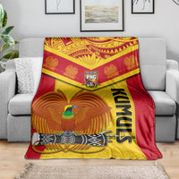 Rugby blanket in red and yellow with PNG crest, bird graphic, and KUMUL text