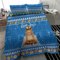 Blue Santa Lucia Christmas duvet with God Jul lettering and decorative border