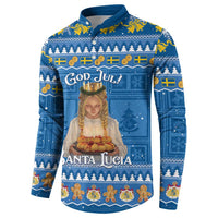 Blue holiday long-sleeve button sweatshirt with Santa Lucia portrait and evergreen trees.
