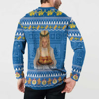 Blue holiday button sweatshirt back on model, Santa Lucia artwork with festive border.
