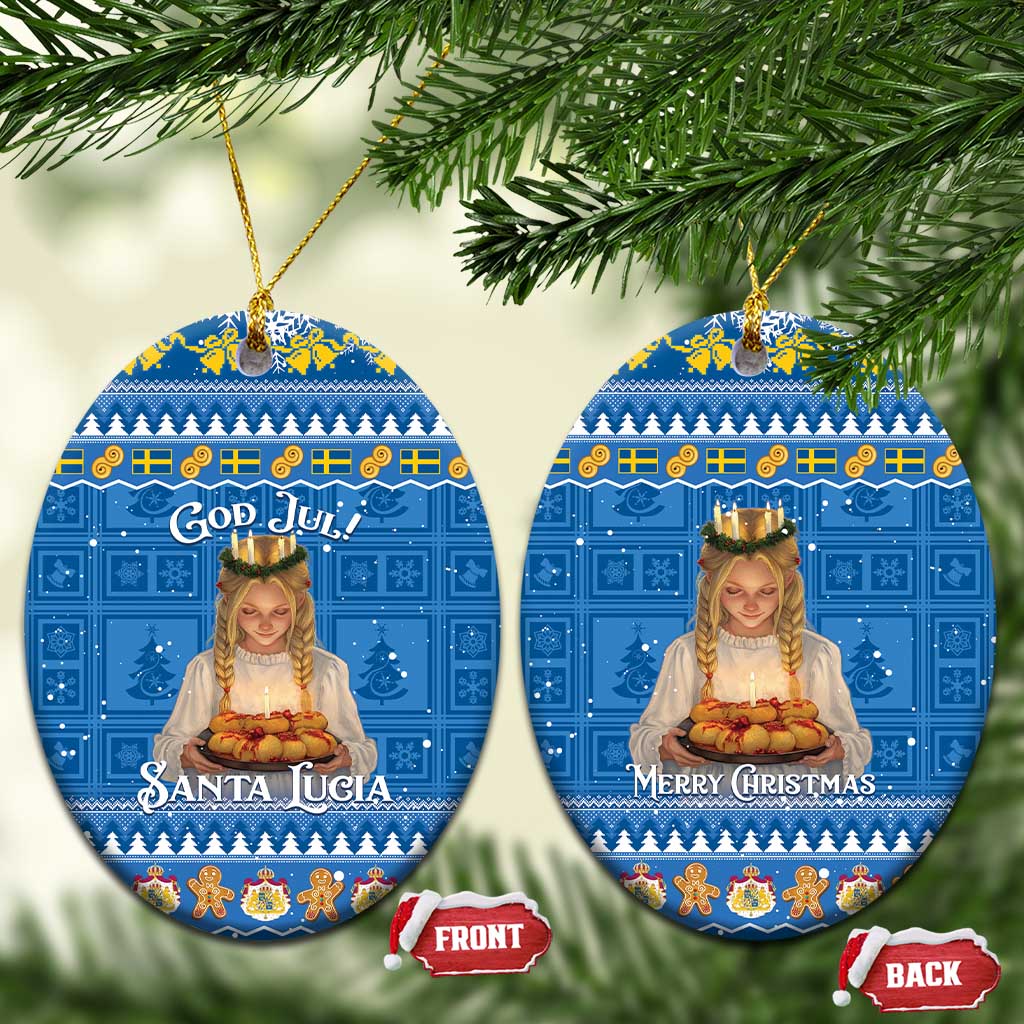 Two blue round ceramic ornaments with gold strings: “God Jul! Santa Lucia” and “Merry Christmas”.