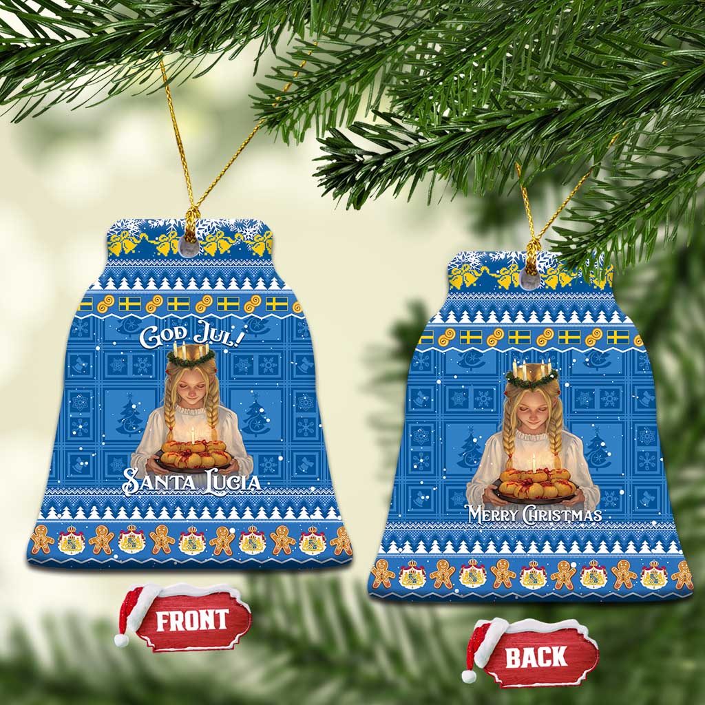 Blue bell-shaped ceramic ornaments: “Santa Lucia” on one, “Merry Christmas” on the other.