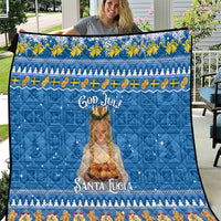 Blue God Jul Santa Lucia quilt with decorative Nordic border and printed saint figure.