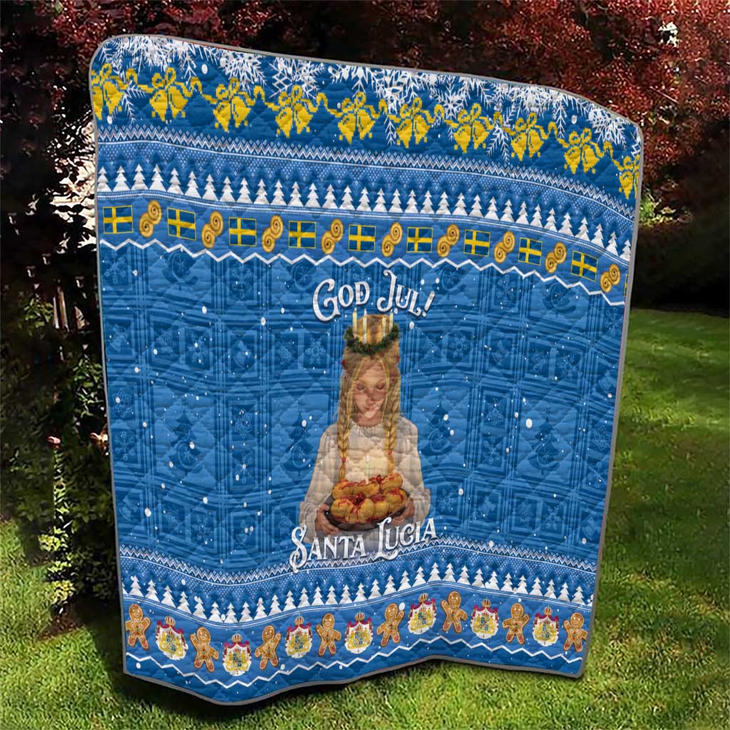 Blue God Jul Santa Lucia quilt with central saint image, snowflake pattern, and festive trim.
