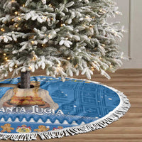 Blue round Christmas tree skirt with Santa Lucia scene and white fringe trim