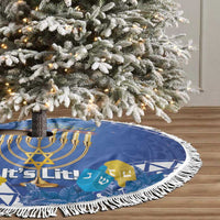 Blue round Hanukkah tree skirt with fringe edge and menorah design on the fabric