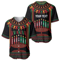 Black Kwanzaa baseball jerseys with kinara candle design, one shows 'YOUR TEXT'