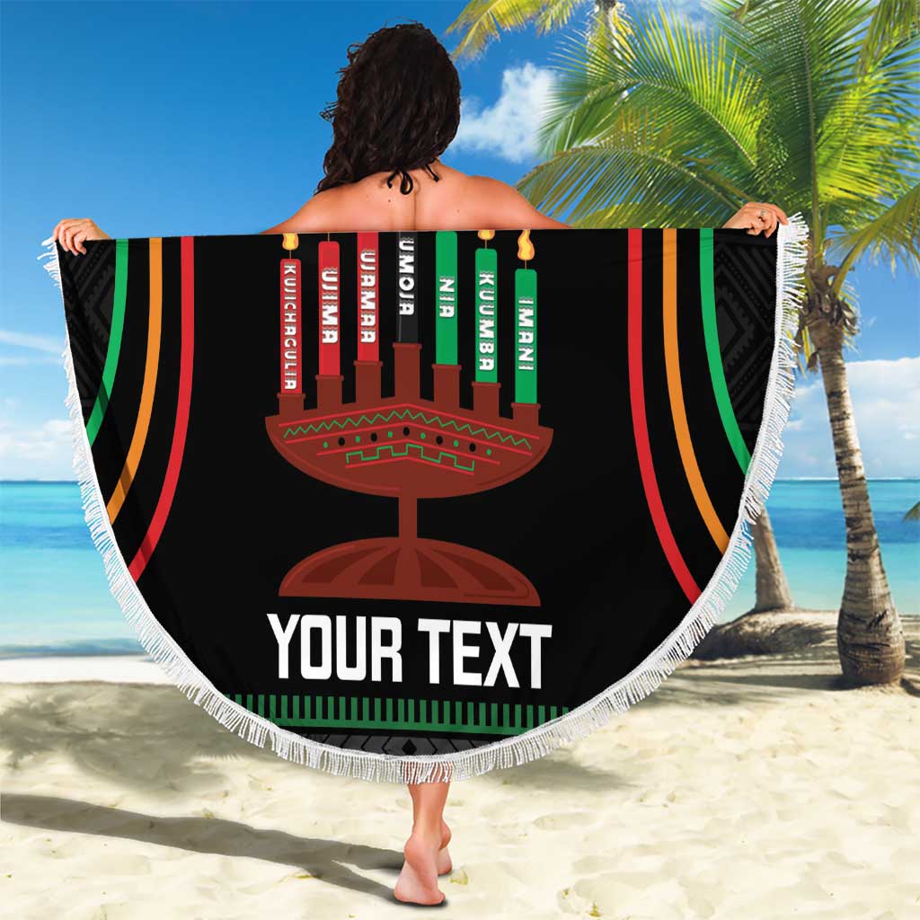 Round black Kwanzaa beach blanket with kinara candles, striped arch design, fringe